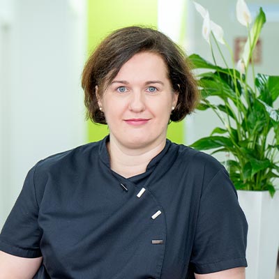 dr. med. dent.* Ilona Biborka Iharosine Kiraly